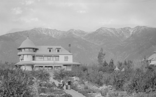 Historic Hollywood mansion used in film and TV for over 100 years ’burns down’ Exterior view of the Andrew McNally residence in Altadena, ca.1900 C. C. Pierce - http://digitallibrary.usc.edu/cdm/ref/collection/p15799coll65/id/25660 Exterior view of the Andrew McNally residence in Altadena, ca.1900 Photograph of the residence of the Andrew McNally and family (of the map making firm of Rand McNally & Company), 654 East Mariposa Street at the corner of Santa Rosa Avenue, Altadena, ca.1900. A long walkway leads up to the house. Many plants and trees crowd the area on either side of the path. The house itself is three stories high and has a round turret at left. General Wentworth and friends are picking flowers in the garden. Part of another house is visible at right. Behind the house can be seen Echo Mountain at the base of the famous Mount Lowe Railway which leads up to the Mount Lowe Tavern (all later dismantled). Also visible is snow-covered Mount Wilson in the winter. Call number: CHS-262 Legacy record ID: chs-m5113; USC-1-1-1-5215 Photographer: C. C. Pierce (1861?1946) Alternative names Charles C. Description American photographer Date of birth/death 22 November 1861 7 November 1946 Location of birth Springfield Authority file : Q61995887 VIAF:?68114291 LCCN:?n91108254 KulturNav:?f9c3334b-1519-4337-9154-3f8b9aa79695 WorldCat