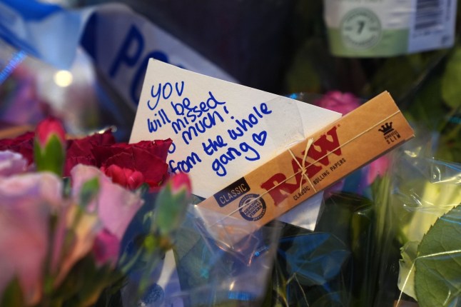 Floral tributes near Greenhill Street, close to Bedford bus station, following the stabbing of Thomas Taylor. The 17-year-old was attacked by a group of males at 5.50pm on Wednesday as he walked along the street. The Bedford Academy student was taken to hospital with serious injuries but was pronounced dead a short time later. Picture date: Thursday January 9, 2025. PA Photo. See PA story POLICE Bedford. Photo credit should read: Lucy North/PA Wire