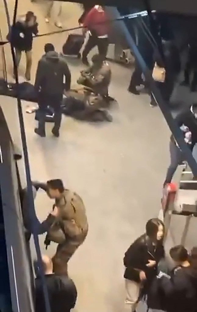 People at the Strasbourg central station after a tram collision.