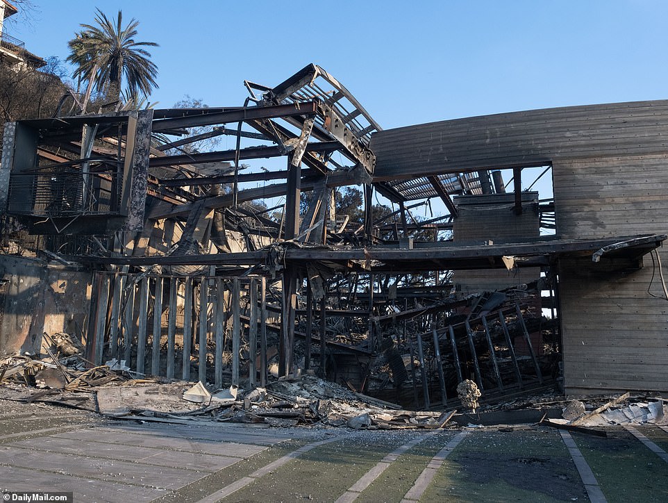 The futuristic four-story property has collapsed in on itself with the iconic decking reduced to smithereens along with the home¿s two panic rooms