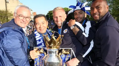 Getty Images Left to right: Claudio Ranieri, Mr Vichai, Kasper Schmeichel, Danny Simpson and Wes Morgan