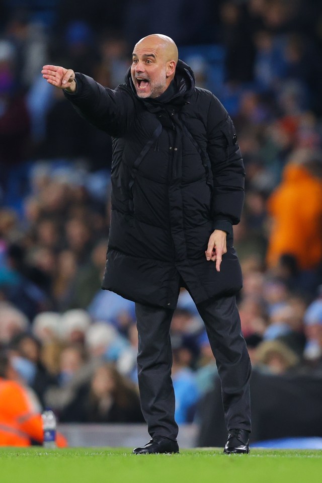 Pep Guardiola, Manchester City manager, coaching during a match.