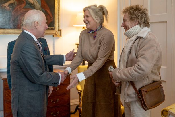 Charles warmly greets Sir Rod and Penny