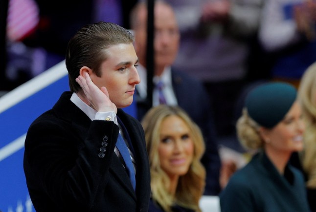 Barron Trump gestures at Capital One Arena on the inauguration day of Donald Trump’s second presidential term, in Washington, U.S. January 20, 2025. REUTERS/Brian Snyder