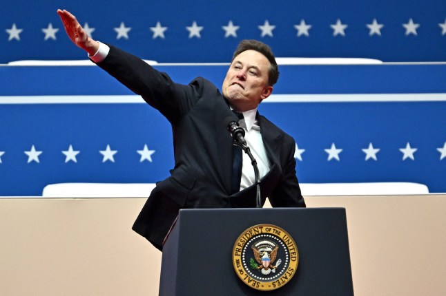 Tesla and SpaceX CEO Elon Musk gestures as he speaks during the inaugural parade inside Capitol One Arena, in Washington, DC, on January 20, 2025. (Photo by ANGELA WEISS / AFP) (Photo by ANGELA WEISS/AFP via Getty Images)