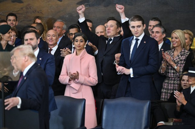 Tesla and SpaceX CEO Elon Musk cheers as US President Donald Trump speaks after being sworn in as the 47th President in the US Capitol Rotunda in Washington, DC, on January 20, 2025. (Photo by SAUL LOEB / POOL / AFP) (Photo by SAUL LOEB/POOL/AFP via Getty Images)