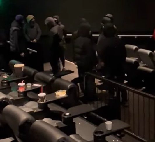 TAKEN WITHOUT PERMISSION - London cinema stormed by masked men