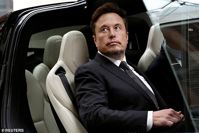 Tesla CEO Elon Musk gets in a Tesla as he leaves a hotel in Beijing, China on May 31, 2023 qeithieiquzinv