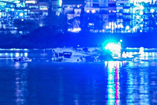 A search in the Potomac River for the American Airlines and US army helicopter after the crash near Washington DC.