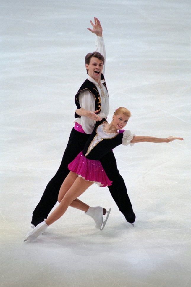 This photo taken on February 24, 1996 shows Russian figure skaters Evgenia Shishkova and Vadim Naumov performing at the Pairs event at the Figure Skating Championship finals in Paris. Russian figure skating couple Evgenia Shishkova and Vadim Naumov, who won the 1994 world pairs title, were on board a US passenger jet that crashed in Washington on January 29, 2025, Russian news agencies reported. The state TASS and RIA news agencies, both citing a source, reported on Thursday the pair were on board the crashed plane. (Photo by Pierre VERDY / AFP) (Photo by PIERRE VERDY/AFP via Getty Images)