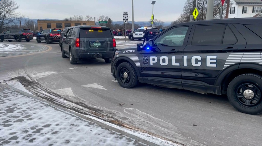 Law enforcement vehicles following a hearse carrying Maland to a funeral home in Burlington on Jan. 23, 2025.