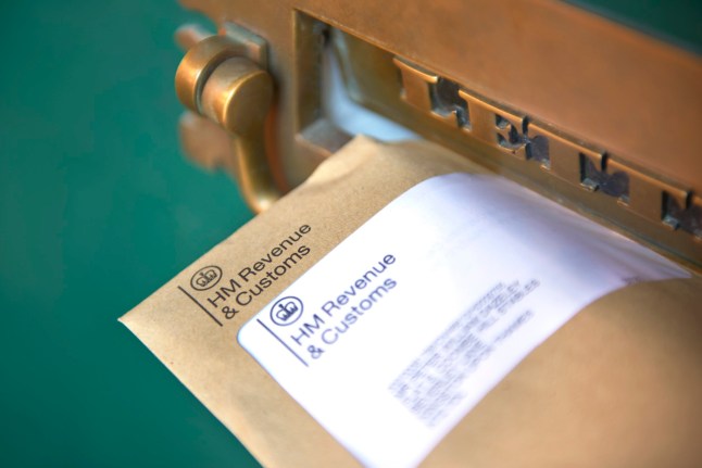 LONDON, UNITED KINGDOM - APRIL 01: Photograph shows a front door letter box with HMRC envelope, Her Majestys Revenue and Customs (HMRC) reminding of the date that self-assessment tax returns need to be completed by self-employed companies and individuals on April 01, 2022 in London, England.(Photo by Peter Dazeley/Getty Images) eiqeriqqqixeinv