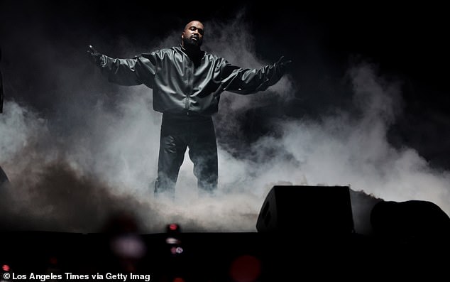 A source said: ’Kanye is just ****ing up every opportunity that comes to him. The stunt was  has been greeted with horror in Japan’ ; pictured performing in LA in 2024