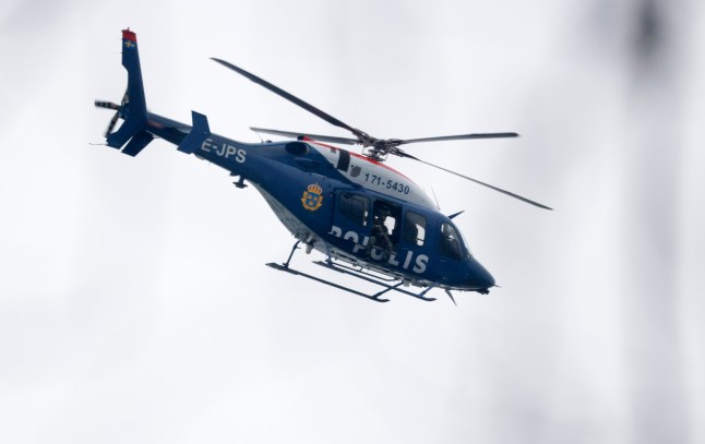 A helicopter at the scene of an incident at Risbergska School, in ??rebro, Sweden, Tuesday, Feb. 4, 2025. (Kicki Nilsson/TT News Agency via AP)