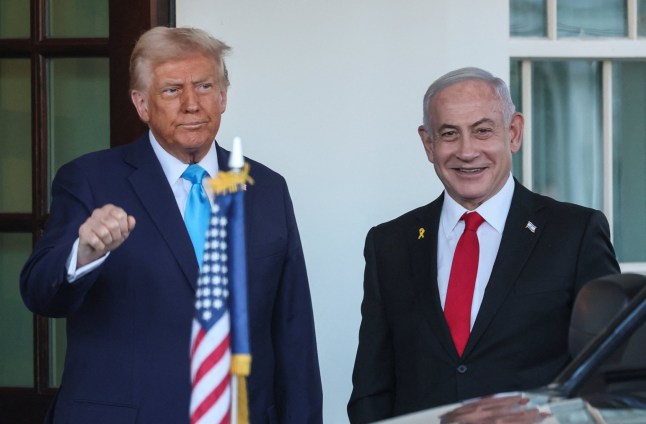 U.S President Donald Trump welcomes Israeli Prime Minister Benjamin Netanyahu at the entrance of the White House in Washington, U.S., February 4, 2025. REUTERS/Leah Millis