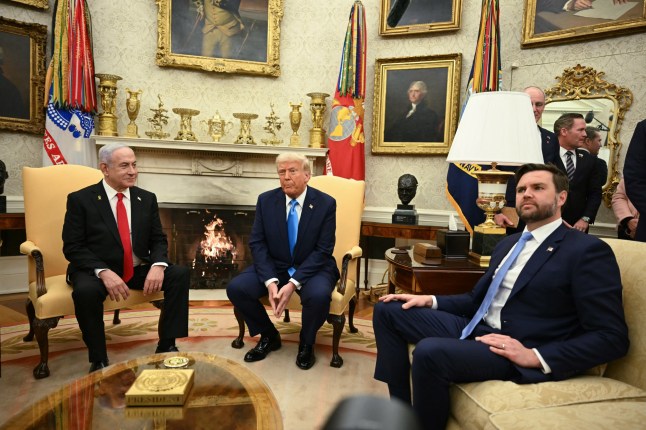 US President Donald Trump (C) and Vice President JD Vance (R) meet with Israel’s Prime Minister Benjamin Netanyahu in the Oval Office of the White House in Washington, DC, on February 4, 2025. (Photo by ANDREW CABALLERO-REYNOLDS / AFP) (Photo by ANDREW CABALLERO-REYNOLDS/AFP via Getty Images)