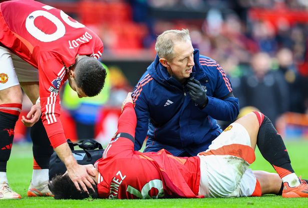 MANCHESTER, ENGLAND - FEBRUARY 2: Manchester United’s Lisandro Martinez lays injured during the Premier League match between Manchester United FC and Crystal Palace FC at Old Trafford on February 2, 2025 in Manchester, England. (Photo by Alex Dodd - CameraSport via Getty Images) eiqxiqeuiqeqinv