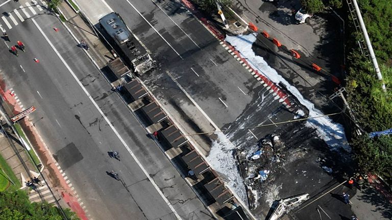 A drone view of the site where a small plane crashed into vehicles on Marques de Sao Vicente Avenue in Sao Paulo.
Pic: Reuters