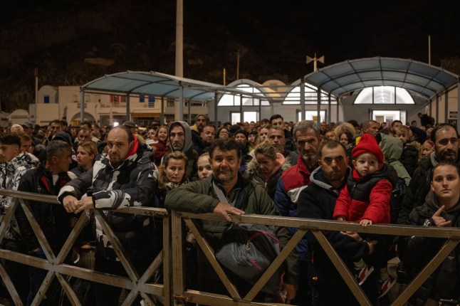 People wait to board a ferry to Piraeus, following an increased seismic activity on the island of Santorini, Greece, February 4, 2025. REUTERS/Alkis Konstantinidis