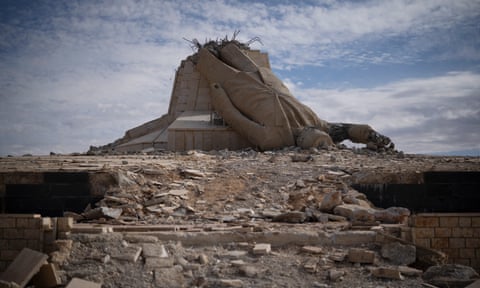 A toppled statue of Hafez al-Assad, father of Bashar al-Assad, in Deir Atiyah, Syria.