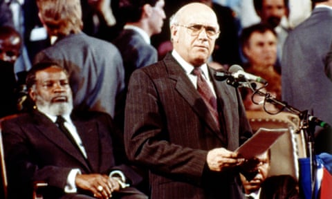 South African president FW de Klerk delivers a speech in Windhoek, where he handed over Namibia to Namibian president Sam Nujoma, seated left, during an independence ceremony on 21 March 1990. eiqeeiqqhiqrrinv