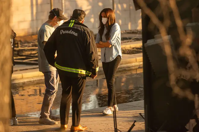 Meghan Markle, Duchess of Sussex, speaks with Pasadena Mayor Victor Gordo, center, and Doug Goodwin, who’s home was destroyed by the Los Angeles wildfires, in Altadena, California.