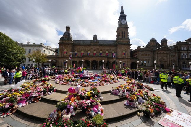 File photo dated 20/8/2024 of flowers and tributes outside the Atkinson Art Centre Southport following the July 29th knife attack in the town, during which three young girls were killed. Axel Rudakubana has been has been detained for life with a minimum term of 52 years. The 18-year-old pleaded guilty to all 16 offences he faced on the first day of his trial at Liverpool Crown Court on Monday. Alice da Silva Aguiar, nine, Bebe King, six, and Elsie Dot Stancombe, seven, died following the attack at a Taylor Swift-themed dance class in The Hart Space in Southport on July 29, 2024. Issue date: Wednesday August 21, 2024. PA Photo. See PA story COURTS Southport. Photo credit should read: Owen Humphreys/PA Wire