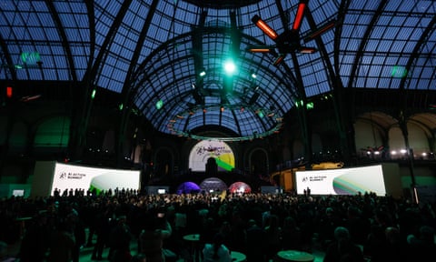 Macron talks at the event held in the Grand Palais in Paris. qhiquqiqhtitqinv