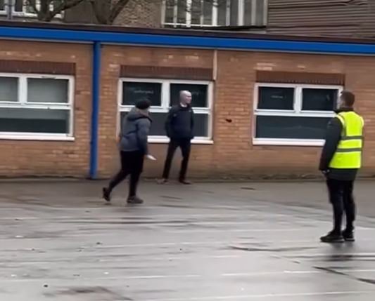 A 12-year-old boy has been arrested after police were called to a high school after a boy was seen in the grounds carrying a large knife. The incident happened on Monday afternoon at Reddish Vale High in Stockport around the end of the school day. A video has been shared online showing what appears to be a boy holding the large bladed weapon. qhidddiquzireinv