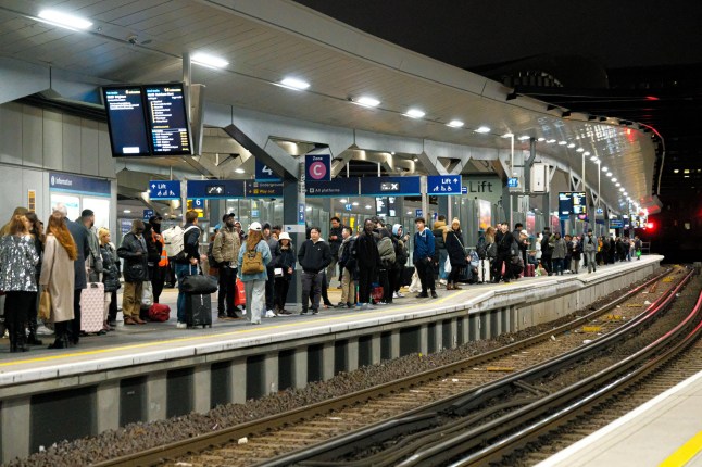 Passengers on a platform at London Bridge station.