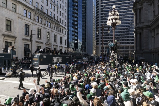 PHILADELPHIA, UNITED STATES - February 14: People take part in the Philadelphia Eagles victory parade, after they won the Super Bowl LIX against the Kansas City Chiefs. Philadelphia, Pennsylvania, U.S., February 14, 2025. (Photo by Mostafa Bassim/Anadolu via Getty Images)