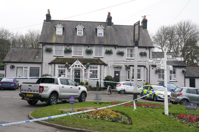 A police cordon at the Three Horseshoes pub in Knockholt, Seveoaks in Kent, after emergency services were called just after 7pm on Friday amid reports a woman had suffered serious injuries. A male suspect fled the scene and is yet to be found. Picture date: Saturday February 15, 2025. PA Photo. See PA story POLICE Kent. Photo credit should read: Gareth Fuller/PA Wire