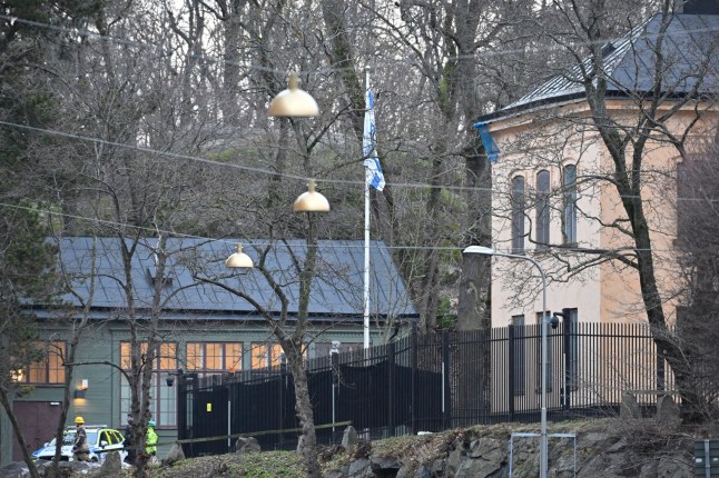 A police car is seen outside the Israeli embassy in Stockholm, January 31, 2024. A hand grenade was found near the Israeli embassy in Stockholm, Sweden on Wednesday, the explosive device was destroyed by the National Bomb Squad. (Photo by Henrik Montgomery/TT / TT News Agency / AFP) / Sweden OUT (Photo by HENRIK MONTGOMERY/TT/TT News Agency/AFP via Getty Images) qhiddeiqtxiqkdinv