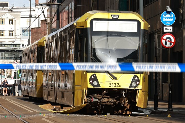 ?? Licensed to London News Pictures. 22/02/2025. Manchester, UK. A tram and a van have collided on Mosley Street resulting in the death of a three year old girl. The van driver is understood to have fled the scene. Photo credit: Joel Goodman/LNP