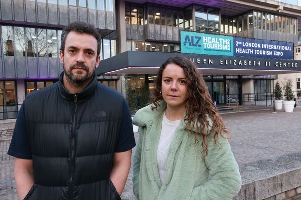 Two Mirror journalists, Matt and Amy, standing outside the QEII Centre after their undercover operation