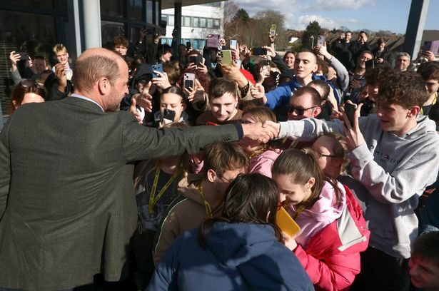 A group of students couldn’t wait to shake hands with the future King