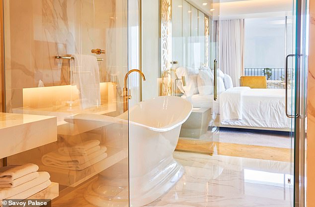 Inside the 352 rooms available at the Savoy Palace, the couple are treated to views of the ocean as well as walk-in wardrobes, a his and her bathroom layout, and a luxury pillow menu