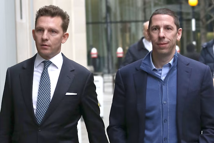 Nick Candy (left) and Christian Candy walking outside the Rolls Building in London.